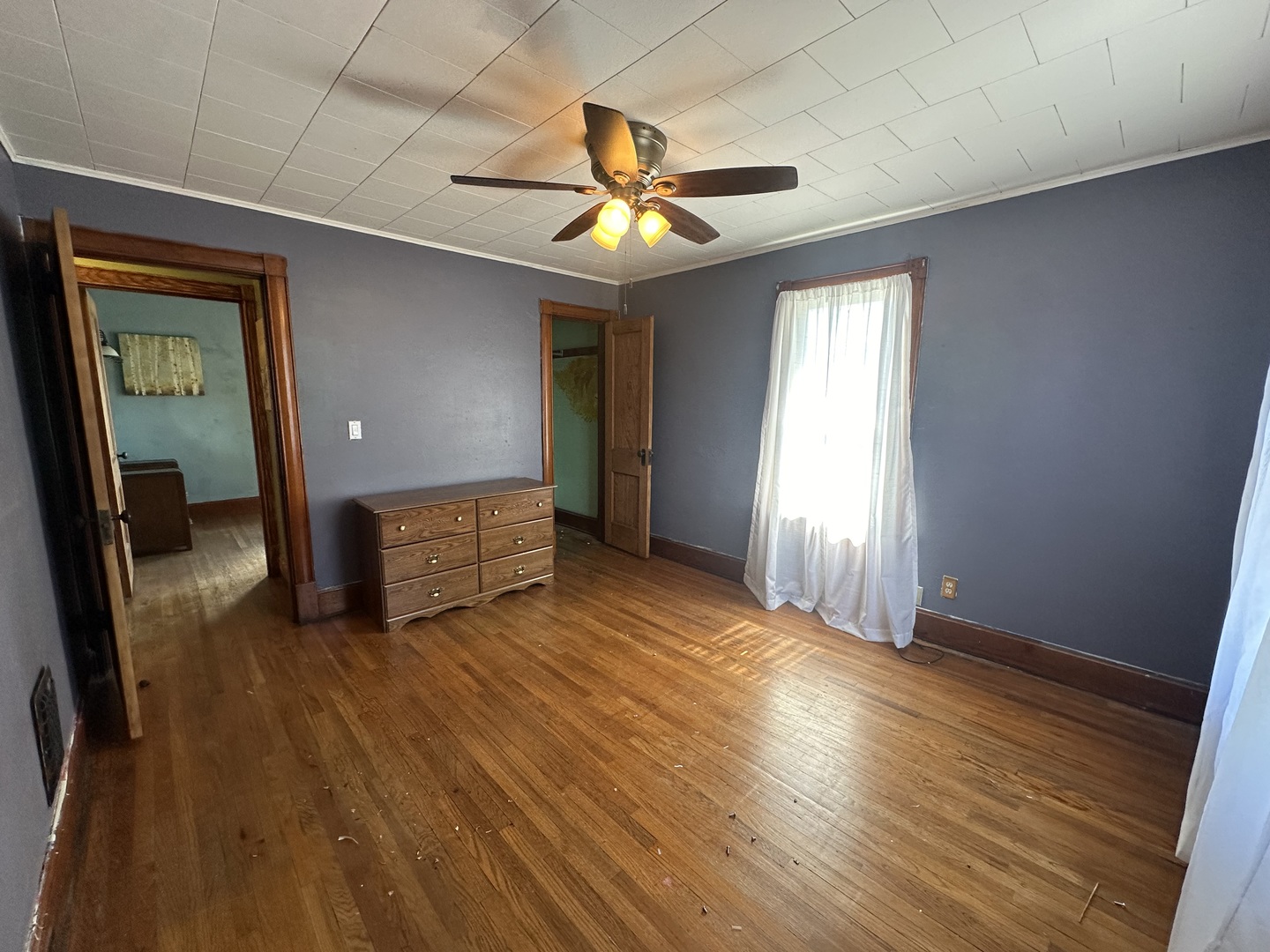 308 South Genesee Street Morrison, IL 61270 - Photo 20 of 24 wooden floor in an empty room with a window