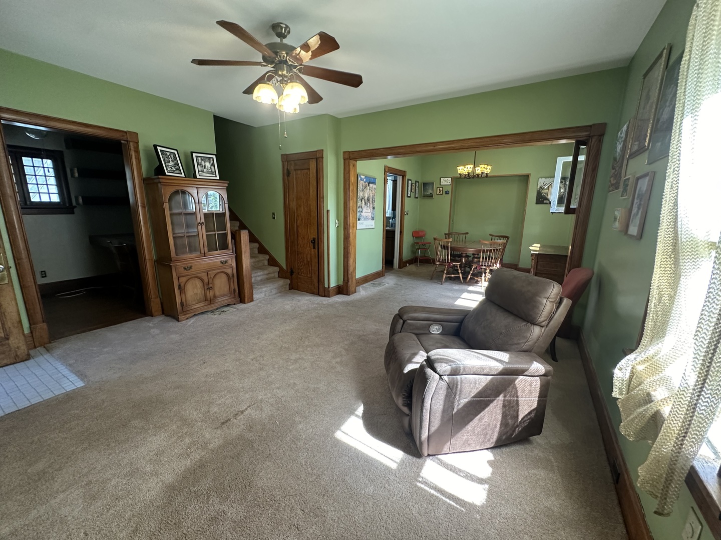 308 South Genesee Street Morrison, IL 61270 - Photo 5 of 24 a living room with furniture and a chandelier