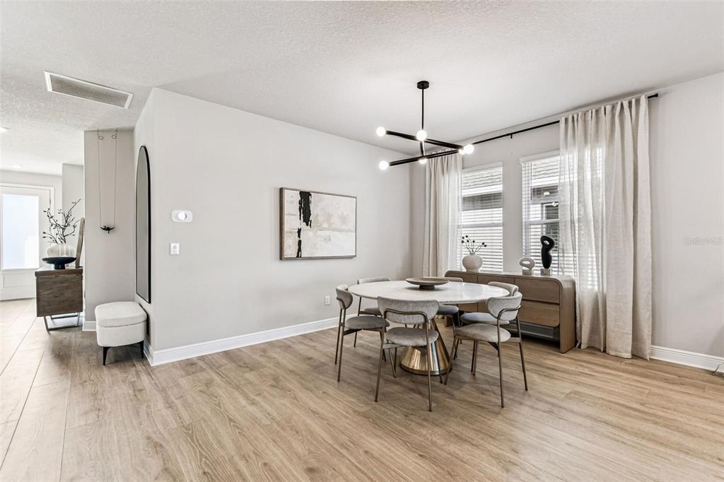 28748 Rambutan Drive Wesley Chapel, FL 33543 - Photo 17 of 37 a workspace with furniture window and wooden floor