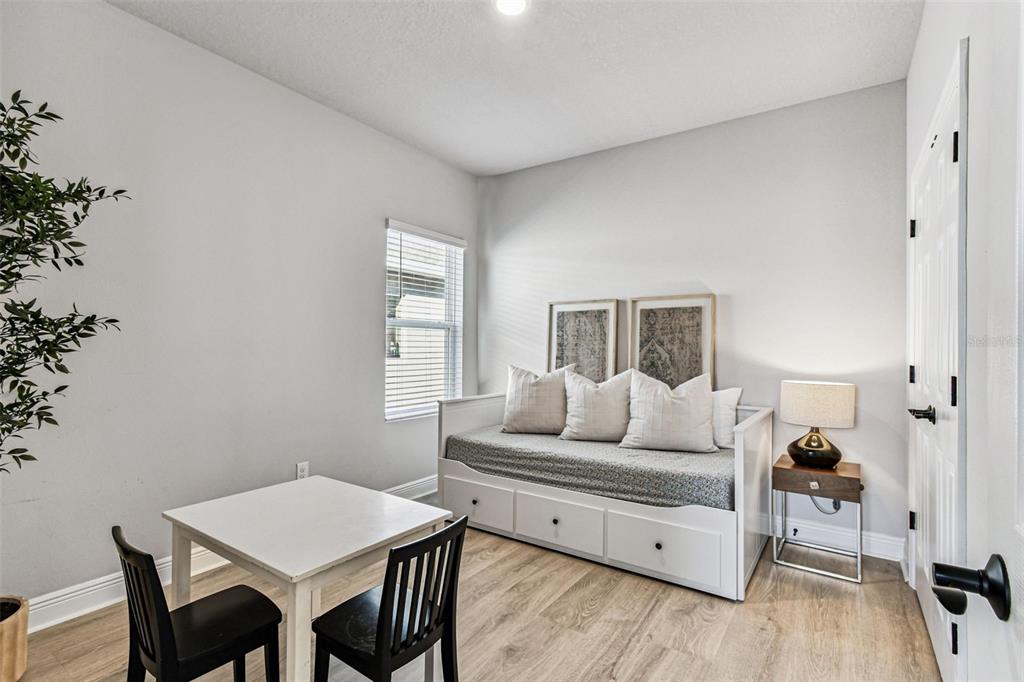 28748 Rambutan Drive Wesley Chapel, FL 33543 - Photo 9 of 37 a living room with furniture and wooden floor
