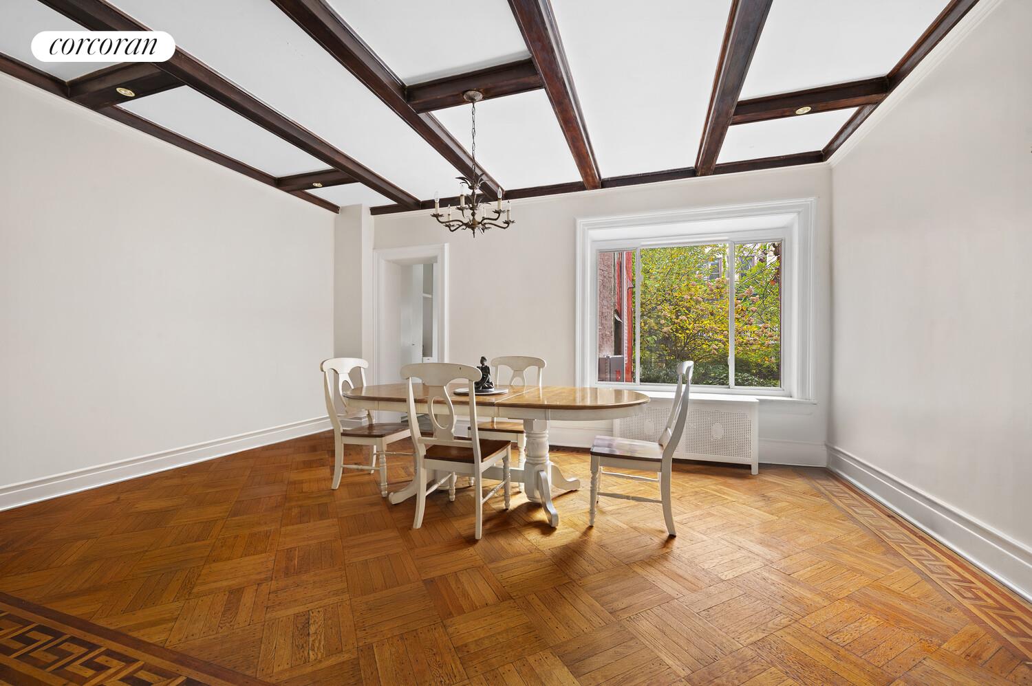 78 Midwood Street Brooklyn, NY 11225 - Photo 3 of 5 a dining room with furniture and a window