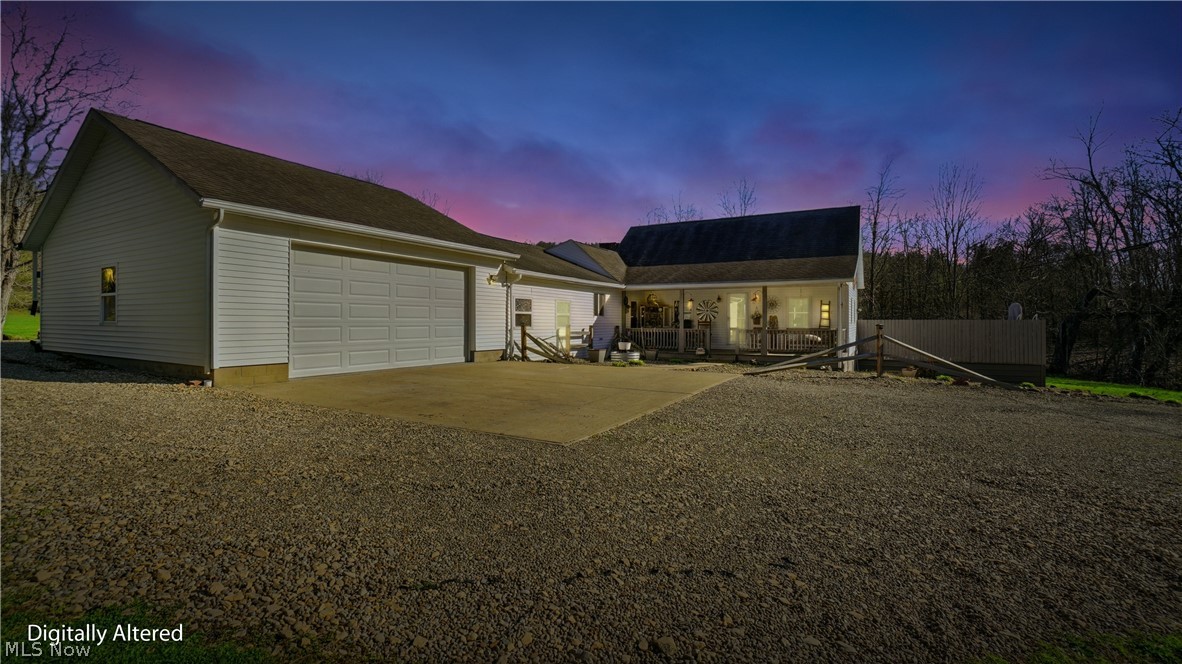 65892 Endley Road Cambridge, OH 43725 - Photo 2 of 50 View of front of property featuring driveway and a garage