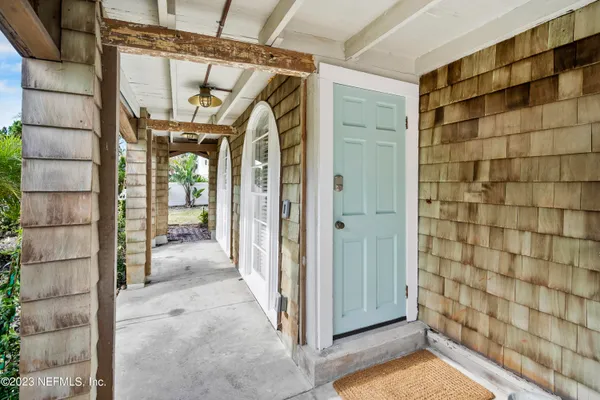 a view of a porch of a house