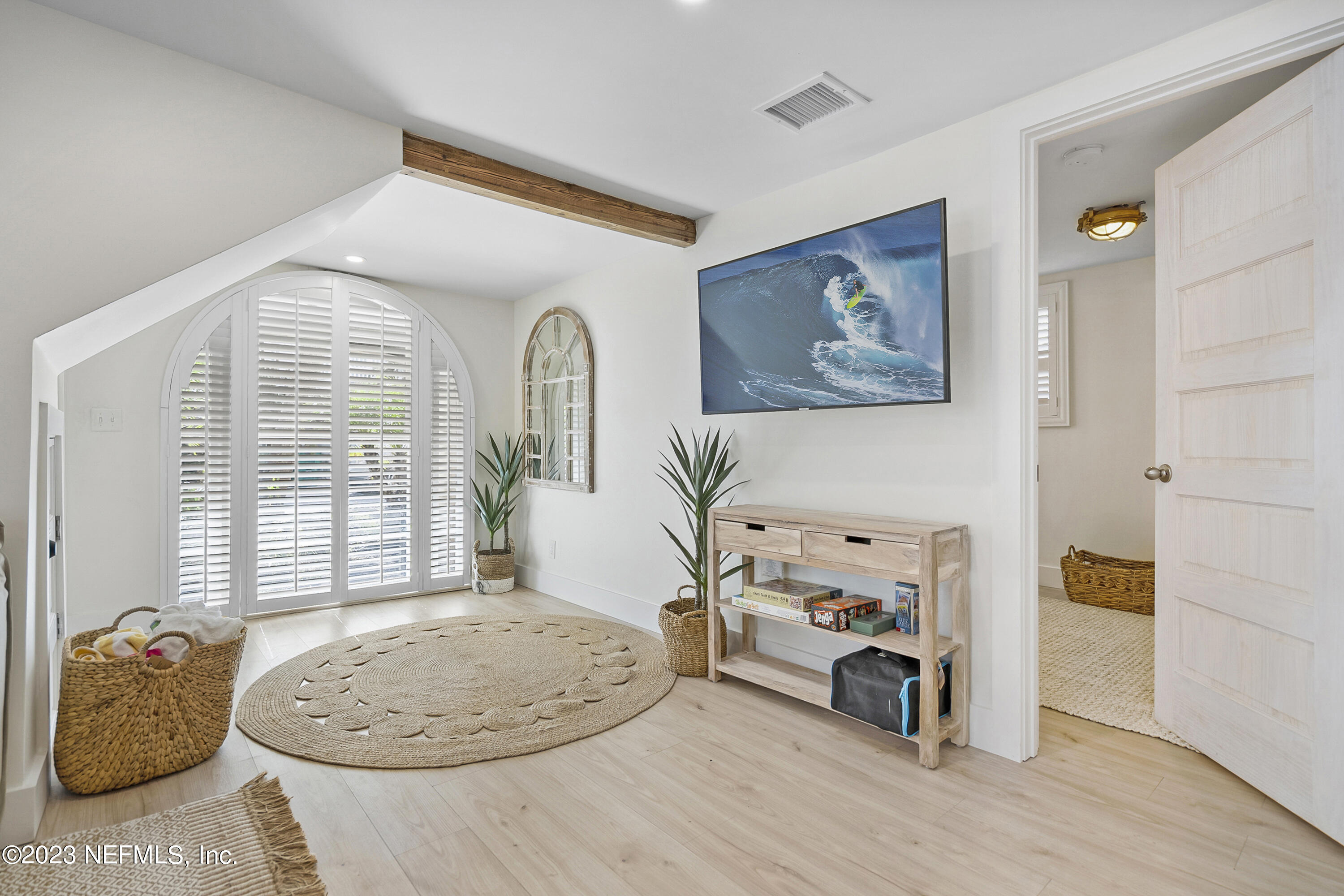 23 26th Avenue South, Unit LOWR Jacksonville Beach, FL 32250 - Photo 12 of 23 a view of livingroom with furniture and a window