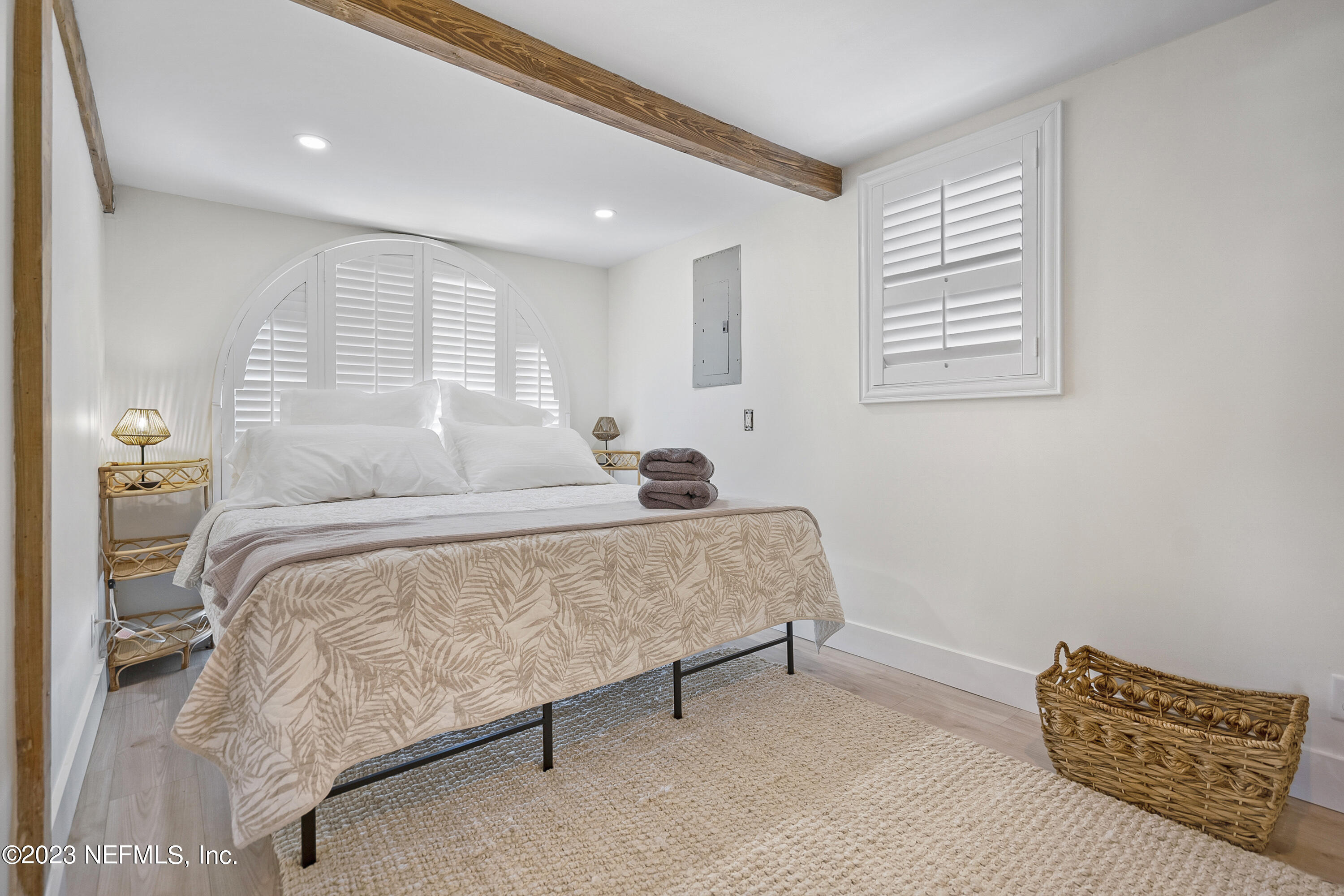 23 26th Avenue South, Unit LOWR Jacksonville Beach, FL 32250 - Photo 13 of 23 a bedroom with a bed and a window