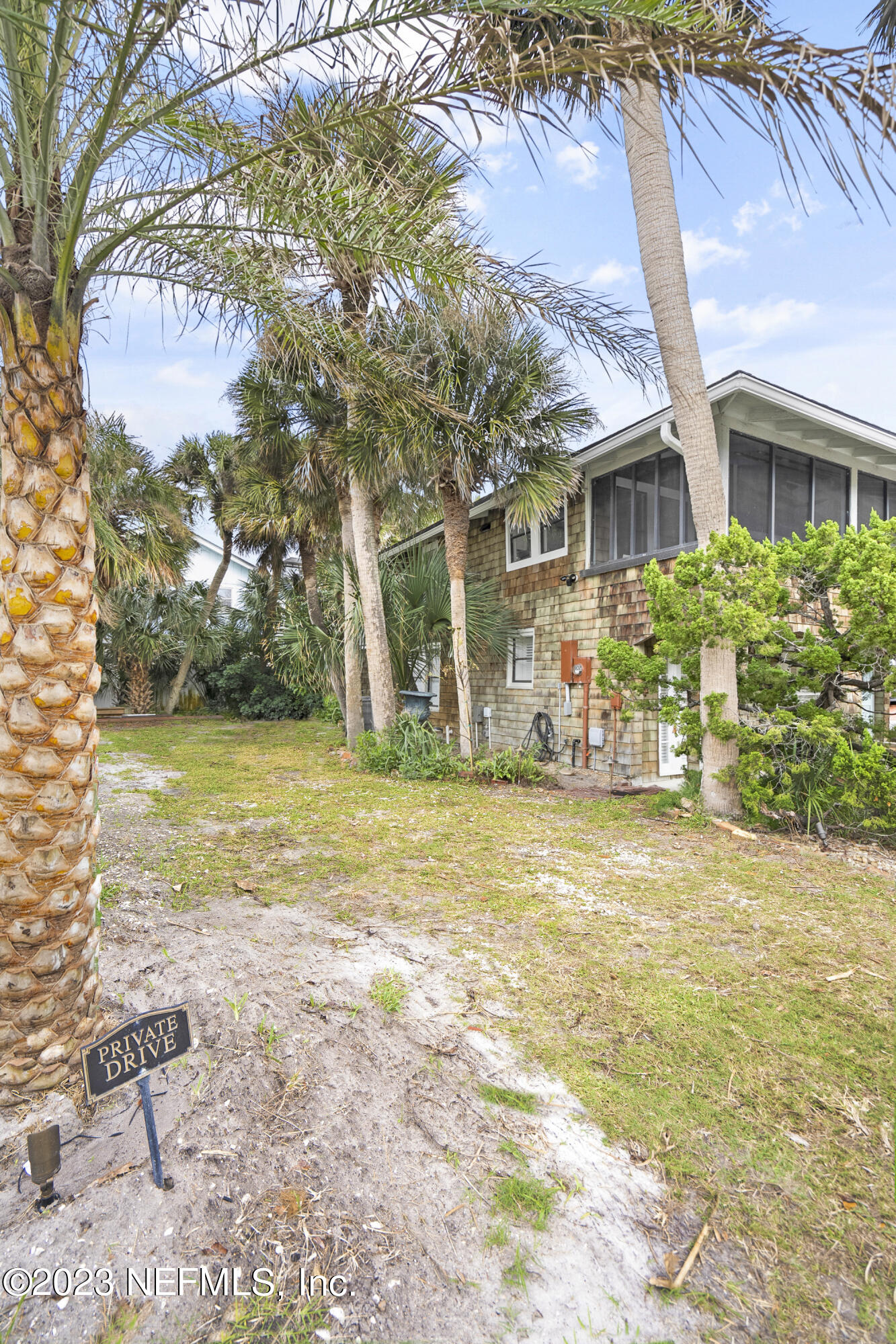 23 26th Avenue South, Unit LOWR Jacksonville Beach, FL 32250 - Photo 20 of 23 a front view of house with yard