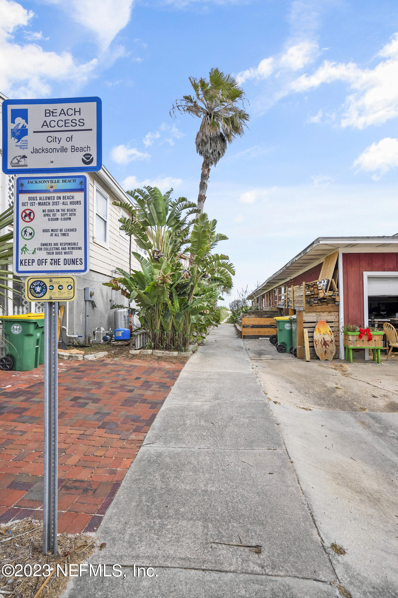23 26th Avenue South, Unit LOWR Jacksonville Beach, FL 32250 - Photo 2 of 23 a front view of a building with garden