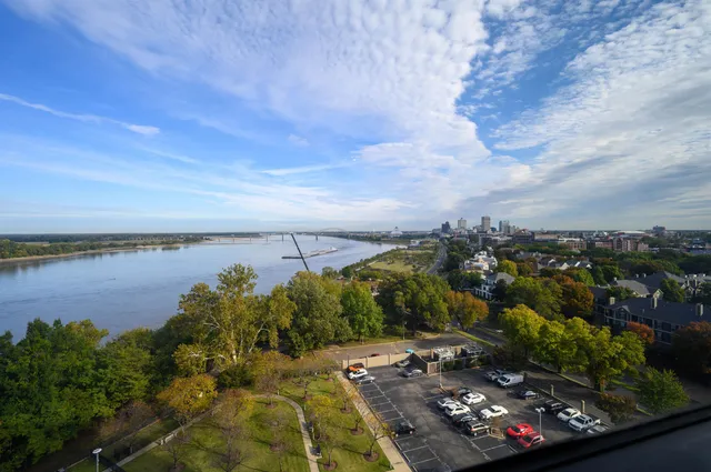 a view of a city and lake