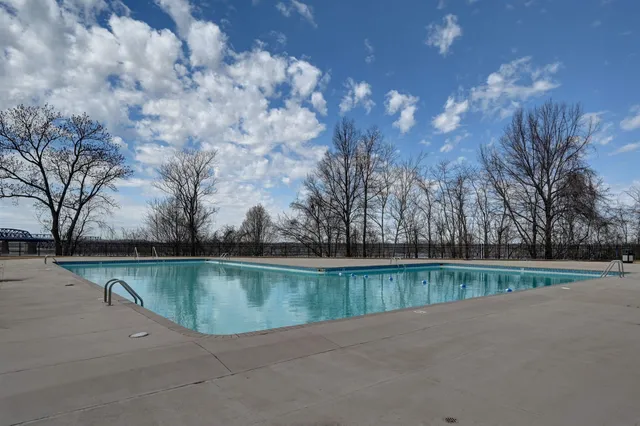 a view of a lake with a yard