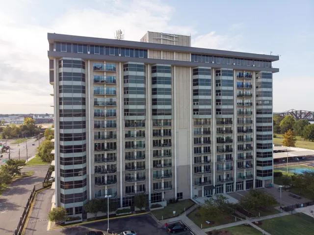 a view of a building with a street