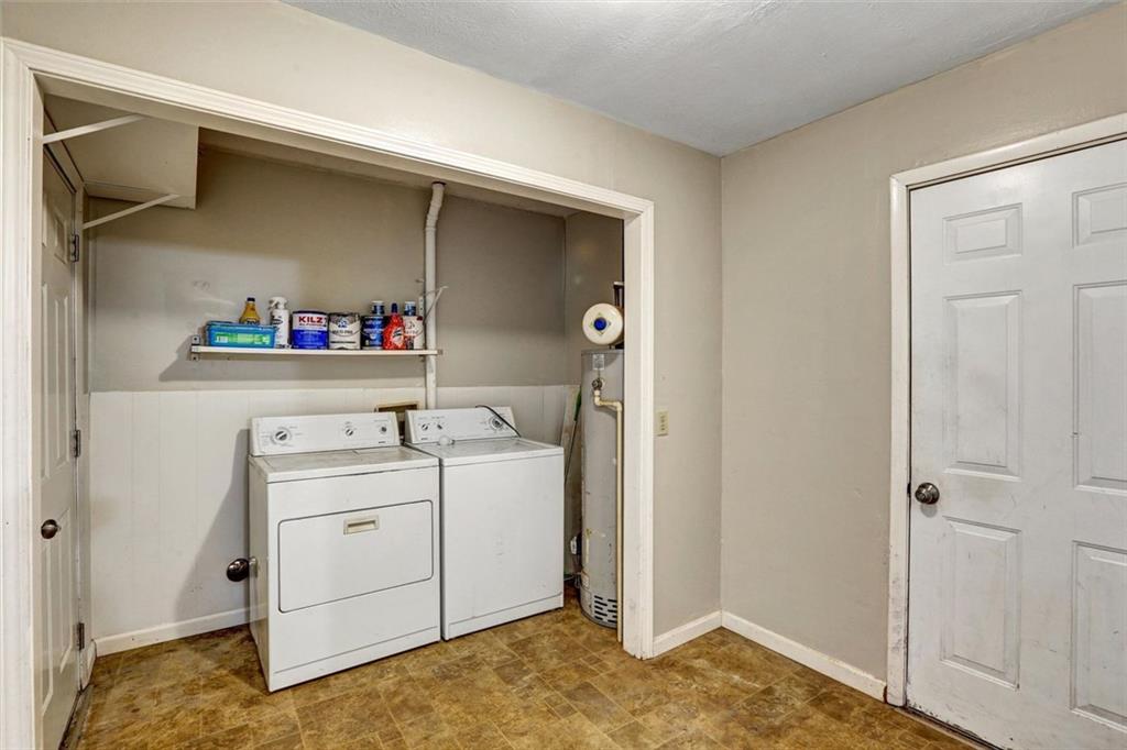 1266 Hickory Drive Southwest Lilburn, GA 30047 - Photo 38 of 49 a room with storage and utility