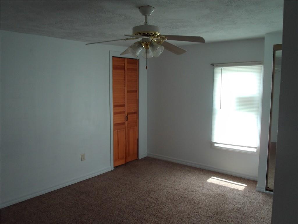 503 Greenfield Road Vanderbilt, PA 15486 - Photo 22 of 36 an empty room with a window