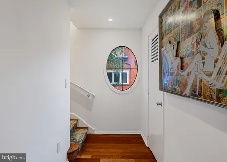 a bed room with a bed and a window