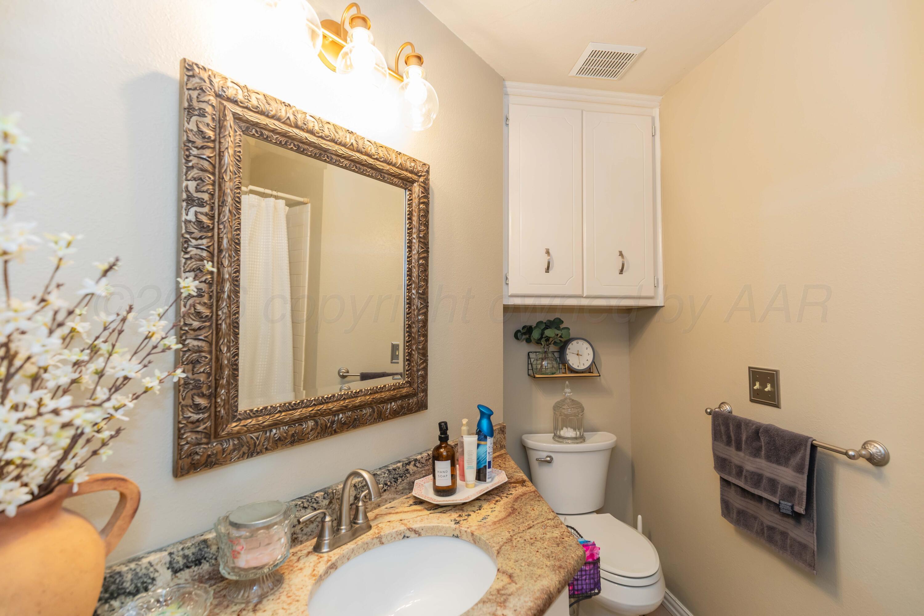 8303 Ranier Drive Amarillo, TX 79110 - Photo 22 of 27 BATHROOM 2