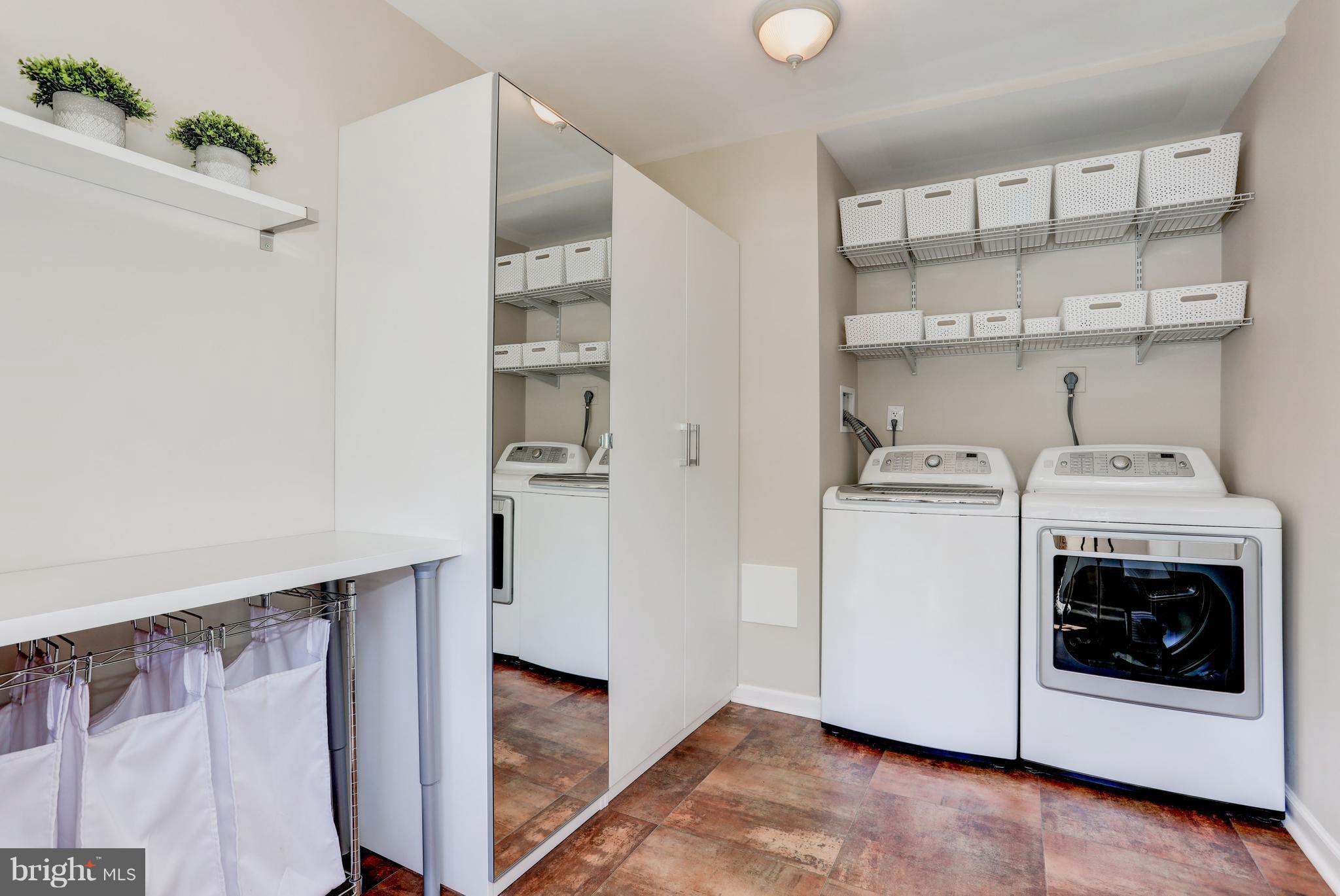 11762 Indian Ridge Road Reston, VA 20191 - Photo 12 of 30 a utility room with dryer and washer