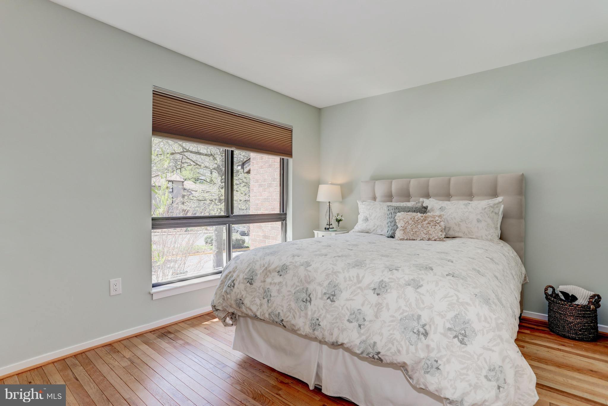 11762 Indian Ridge Road Reston, VA 20191 - Photo 16 of 30 a bedroom with a bed and a window