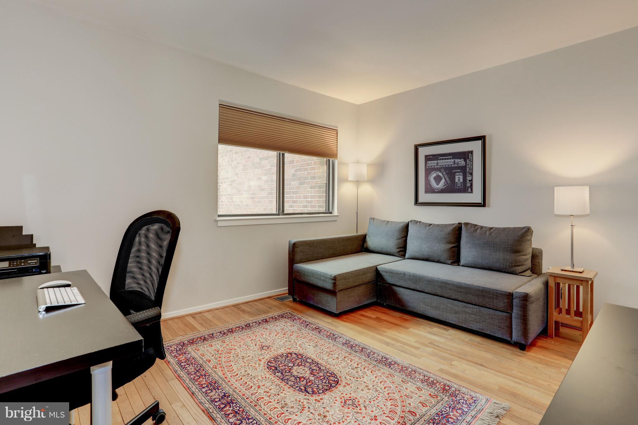 11762 Indian Ridge Road Reston, VA 20191 - Photo 17 of 30 a living room with furniture and a window