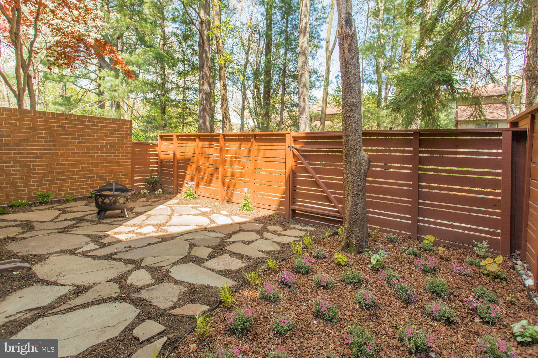11762 Indian Ridge Road Reston, VA 20191 - Photo 25 of 30 a view of a backyard of the house