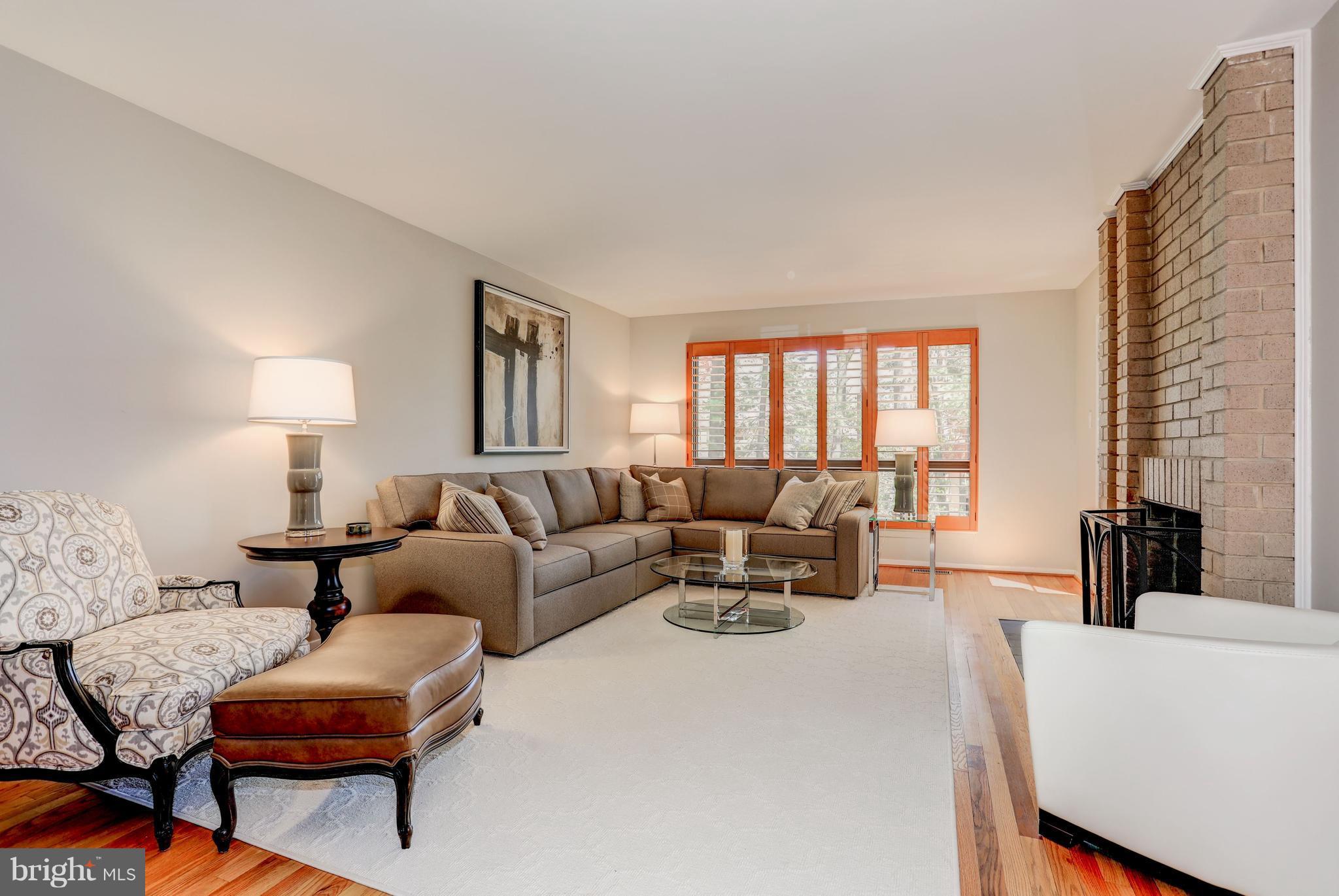 11762 Indian Ridge Road Reston, VA 20191 - Photo 5 of 30 a living room with furniture and a large window