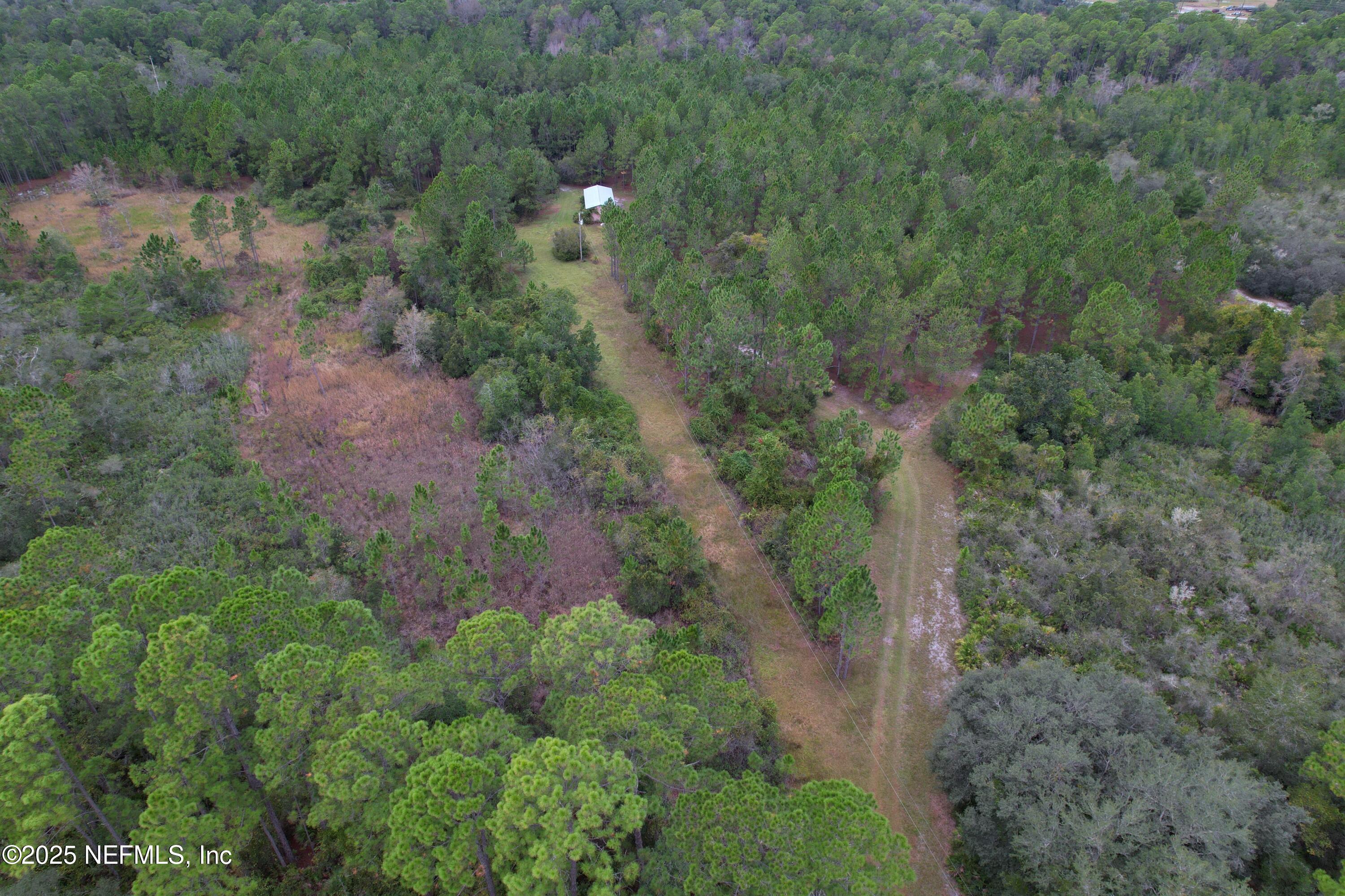 139 Lakeway Drive Georgetown, FL 32139 - Photo 10 of 59 an aerial view of a house with a yard
