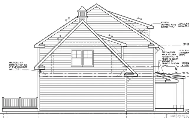 a view of a balcony with white walls