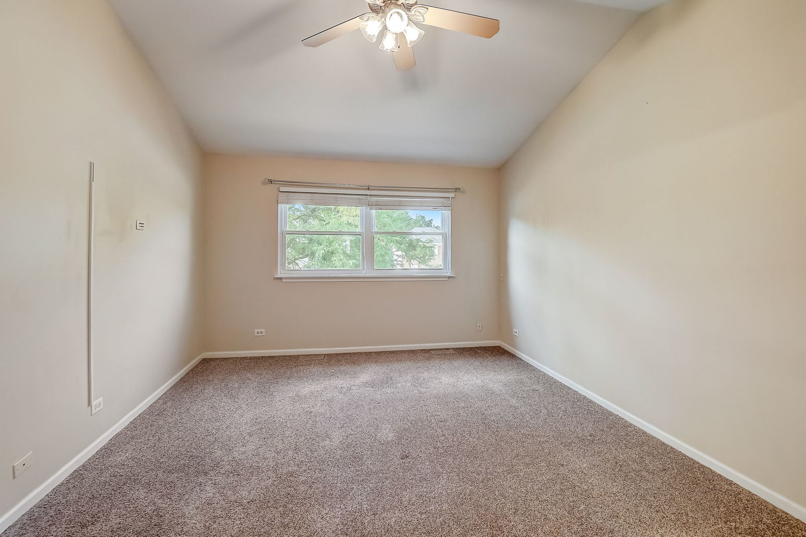 733 Thunderbird Trail Carol Stream, IL 60188 - Photo 11 of 31 an empty room with a window