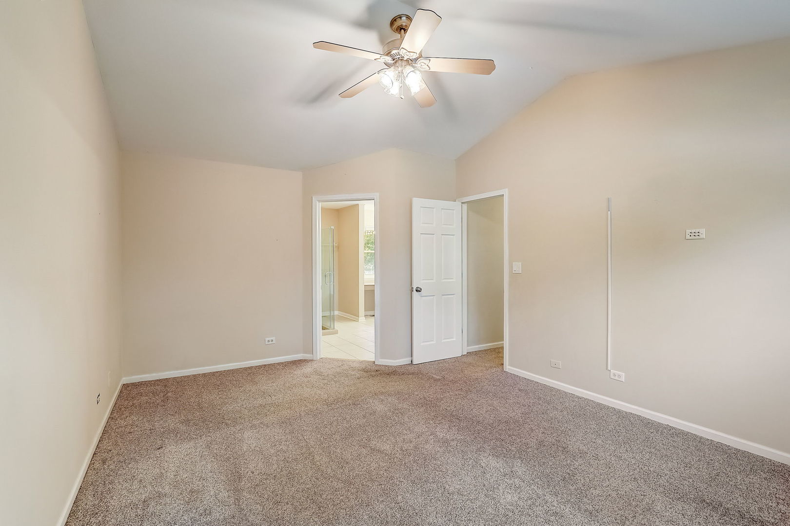 733 Thunderbird Trail Carol Stream, IL 60188 - Photo 12 of 31 a view of a room with a ceiling fan and a fan