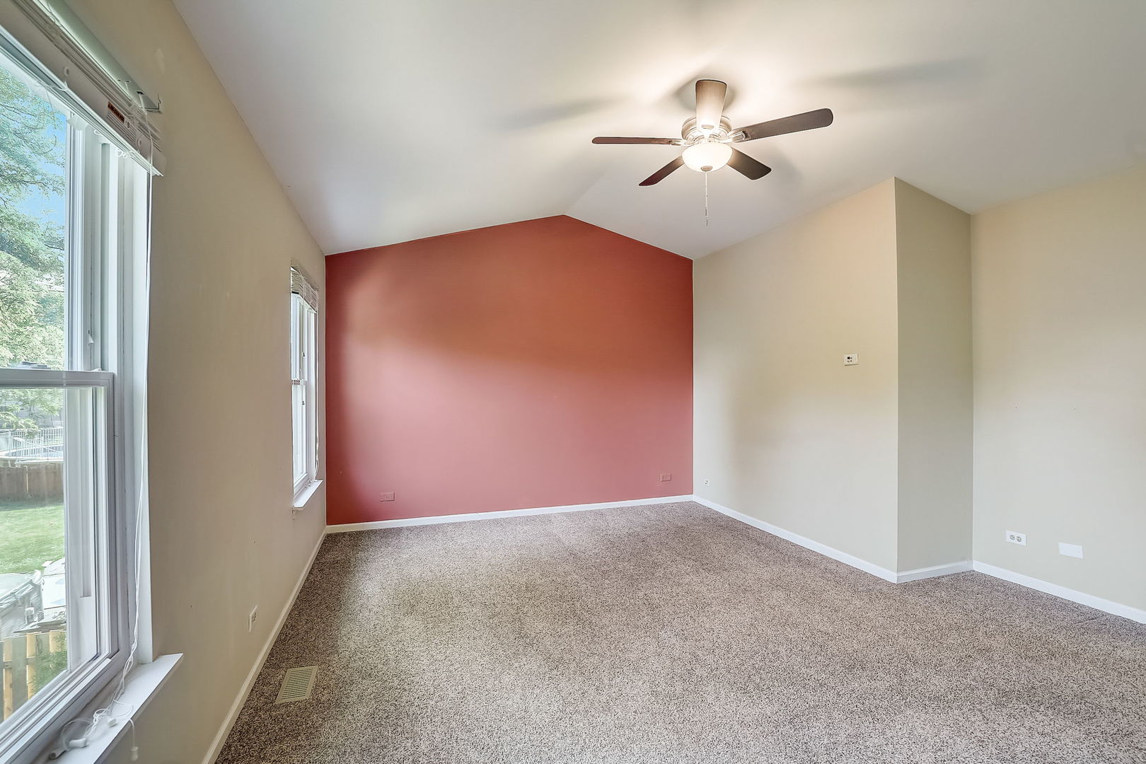 733 Thunderbird Trail Carol Stream, IL 60188 - Photo 15 of 31 an empty room with fan and windows