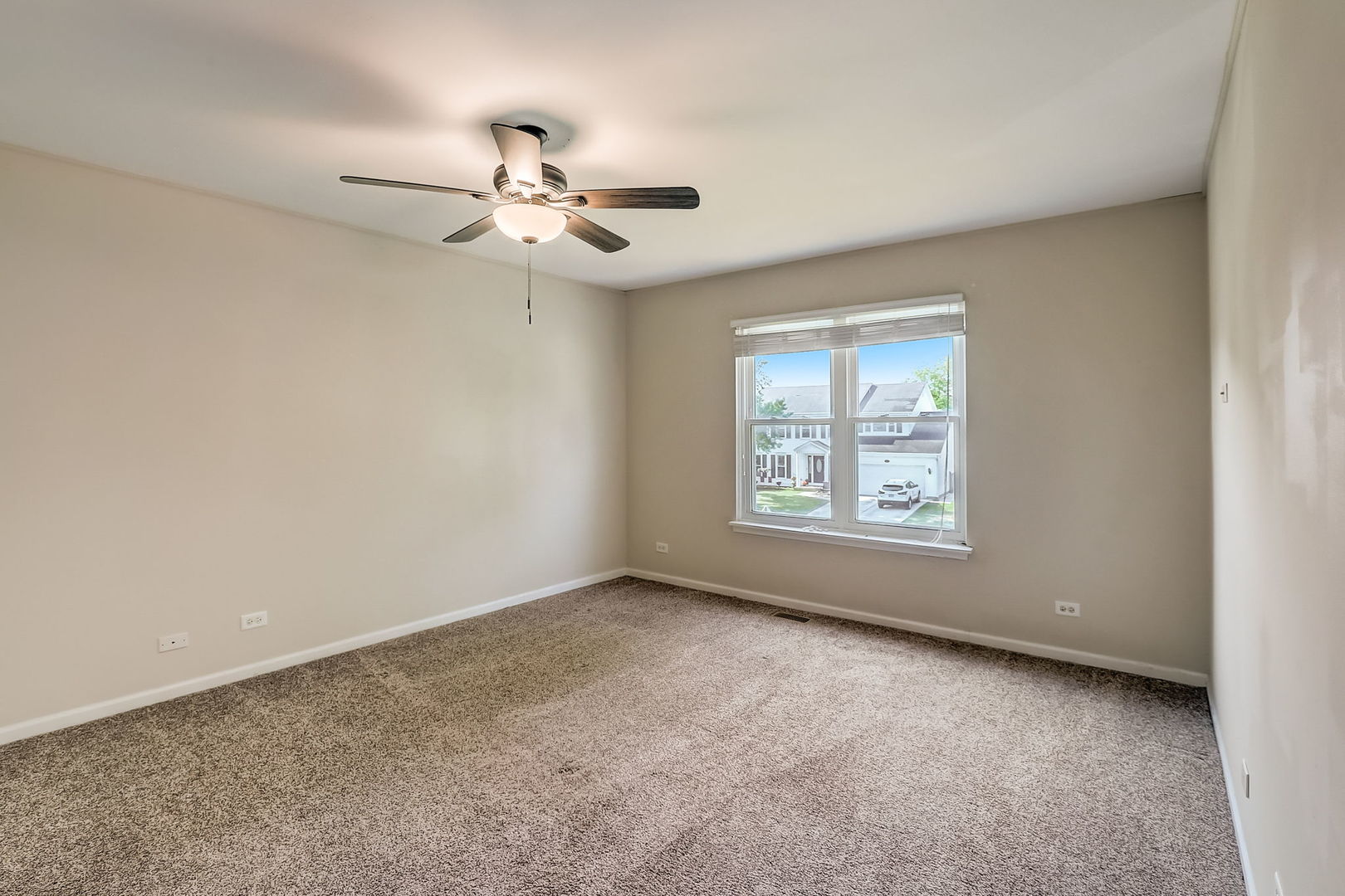 733 Thunderbird Trail Carol Stream, IL 60188 - Photo 18 of 31 a view of an empty room with a window