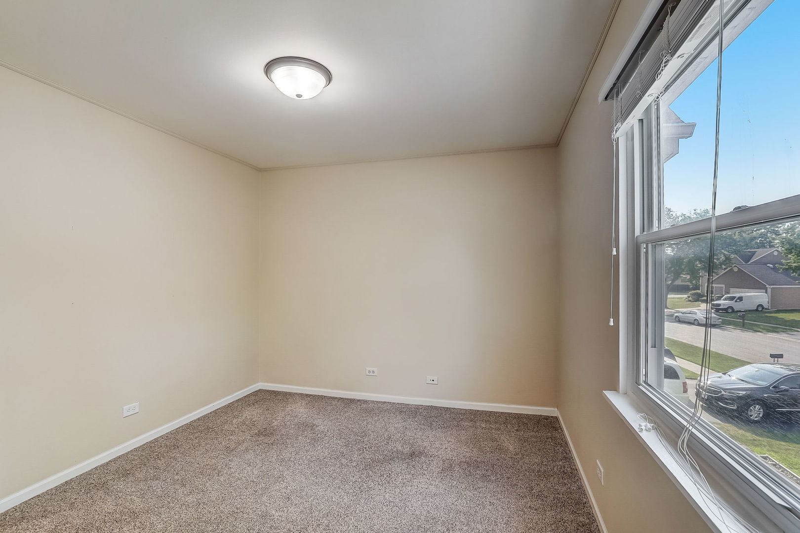 733 Thunderbird Trail Carol Stream, IL 60188 - Photo 20 of 31 a view of an empty room with a window