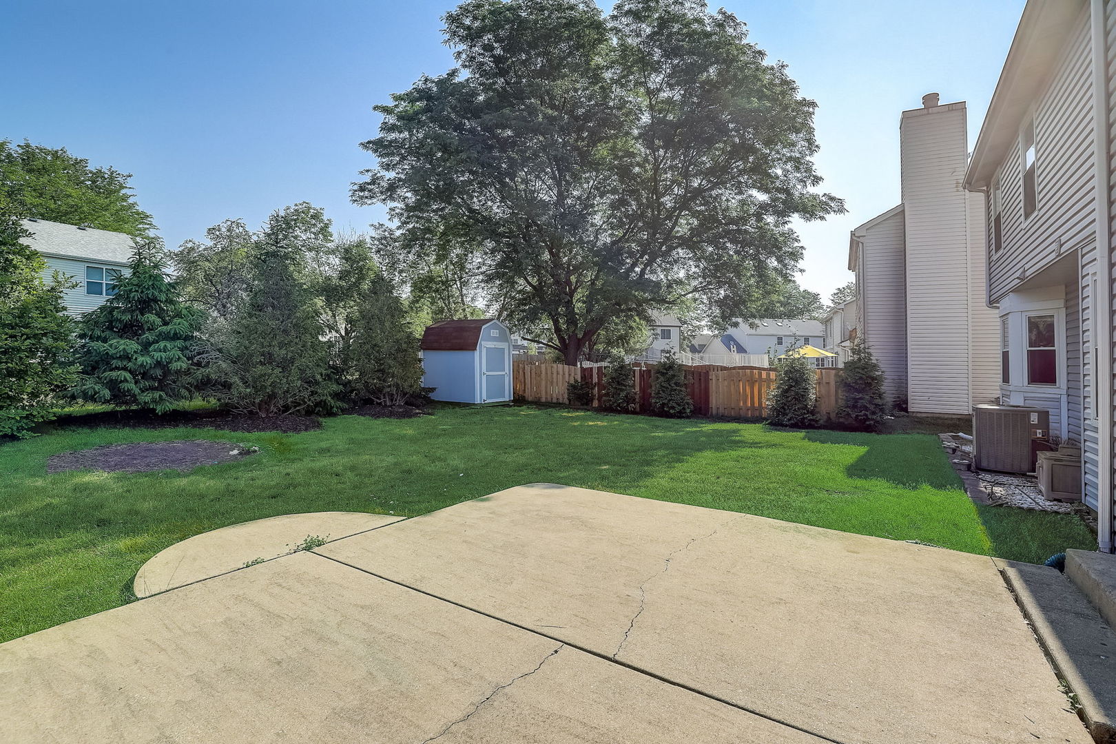 733 Thunderbird Trail Carol Stream, IL 60188 - Photo 23 of 31 a view of a house with a yard