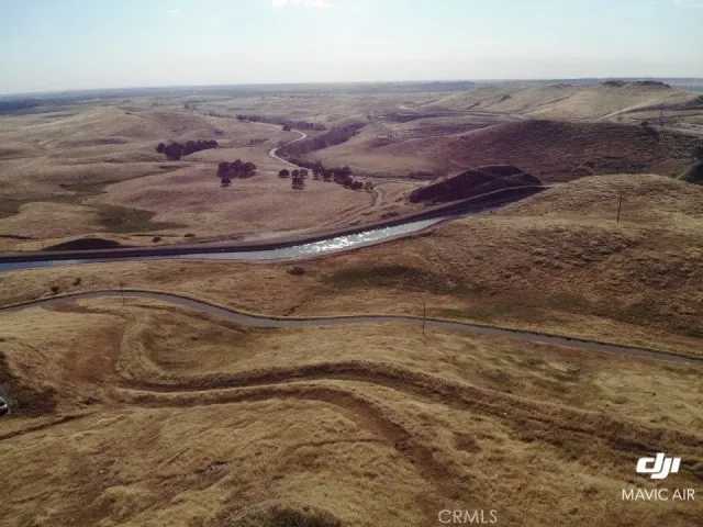 a view of mountains and an ocean