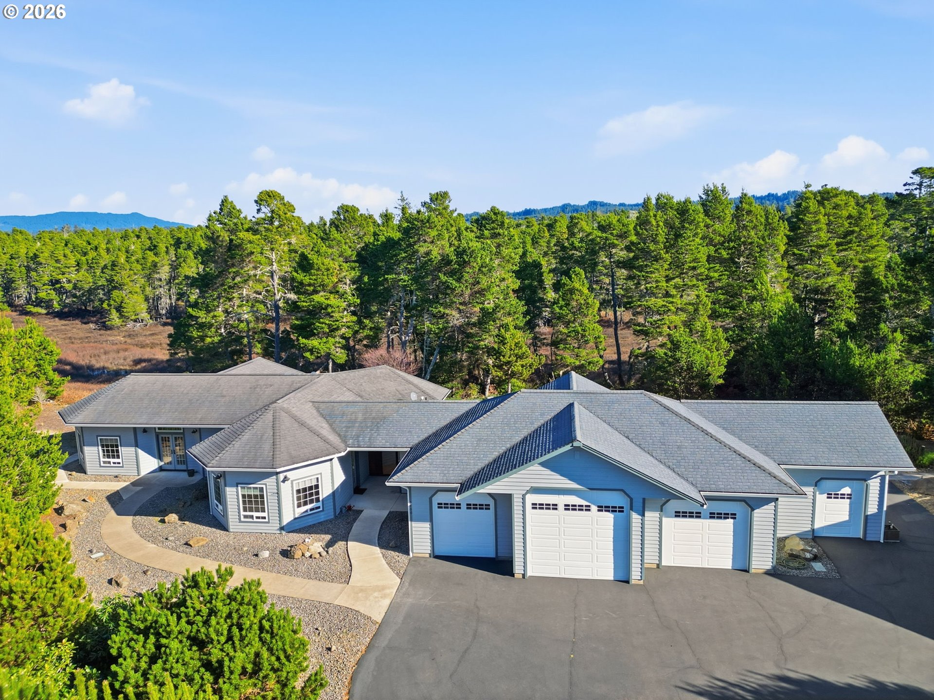 5200 Dunewood Drive Florence, OR 97439 - Photo 1 of 48 a aerial view of a house