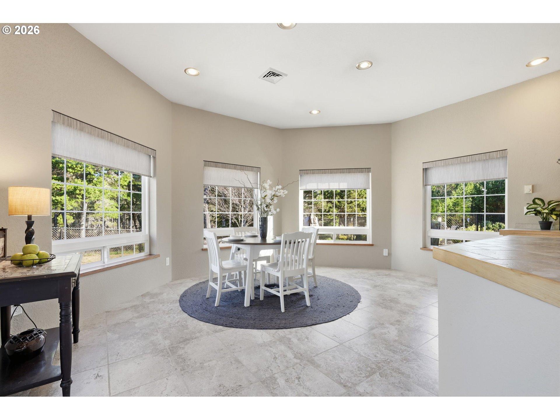 5200 Dunewood Drive Florence, OR 97439 - Photo 16 of 48 a view of a dining room with furniture wooden floor and a chandelier