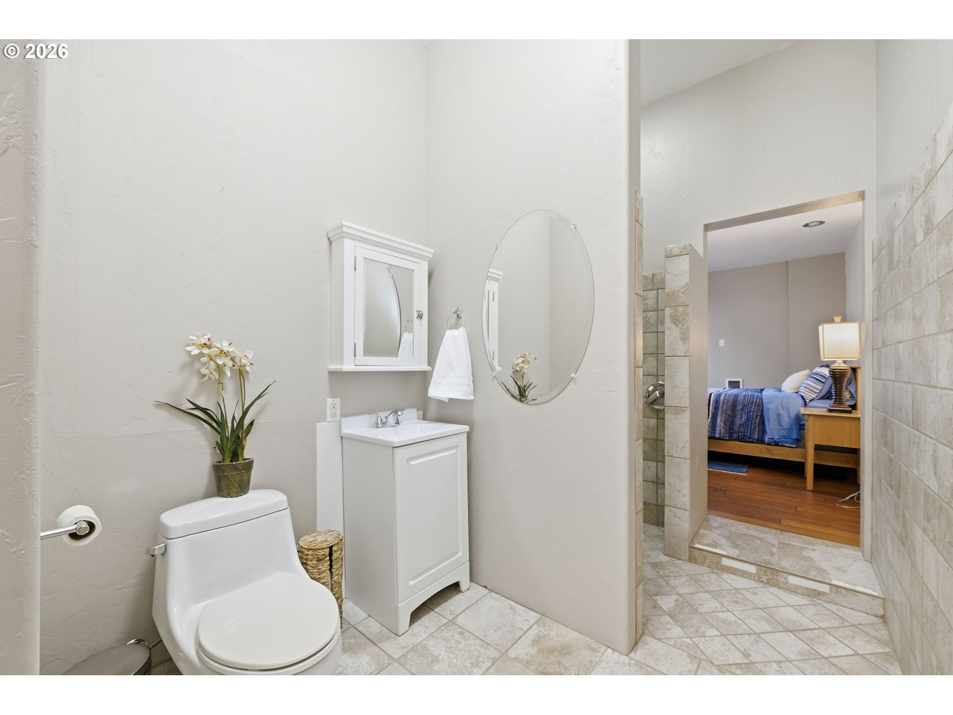 5200 Dunewood Drive Florence, OR 97439 - Photo 28 of 48 a bathroom with a toilet and a mirror