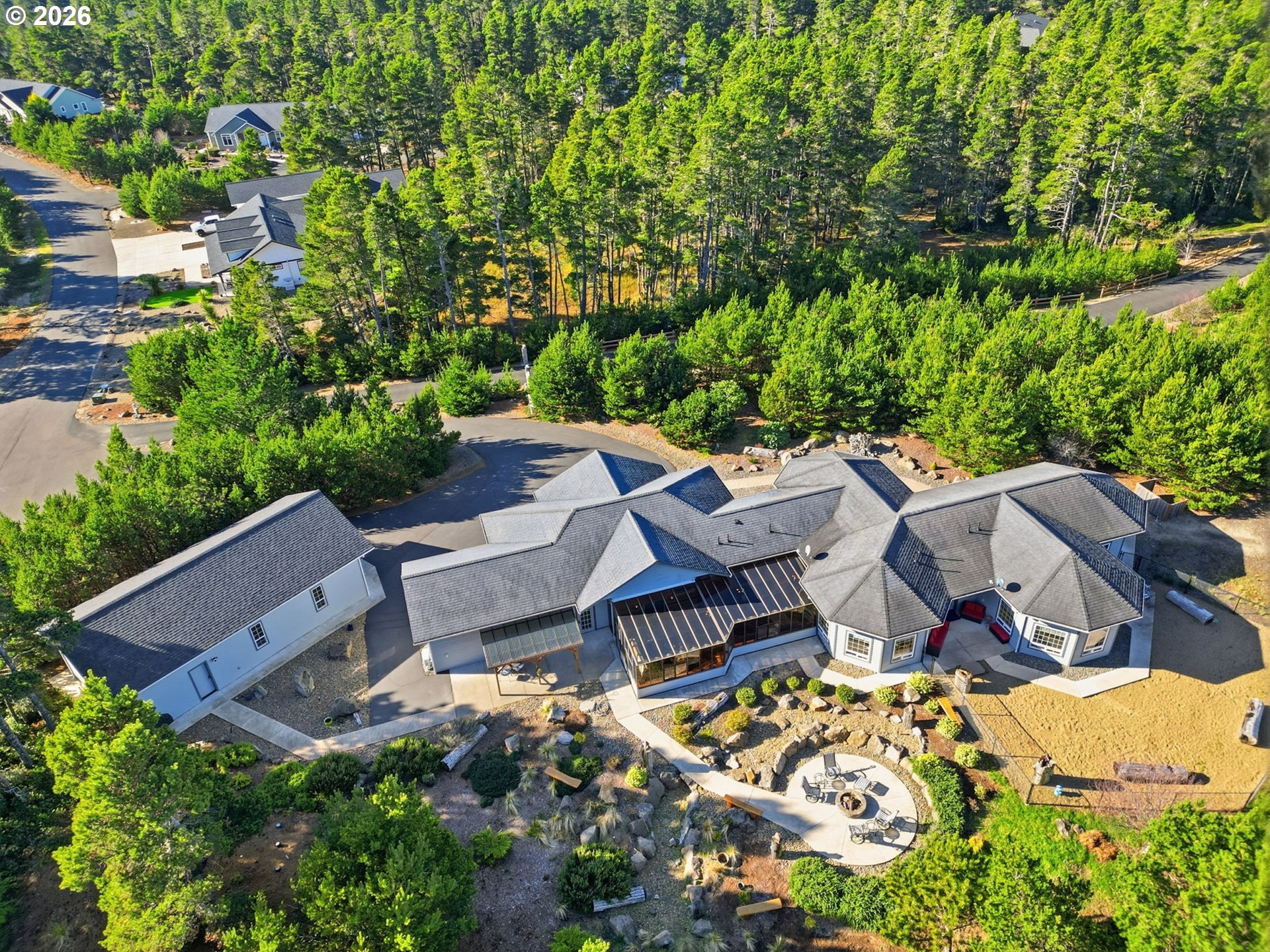 5200 Dunewood Drive Florence, OR 97439 - Photo 4 of 48 an aerial view of a house with yard swimming pool and outdoor seating