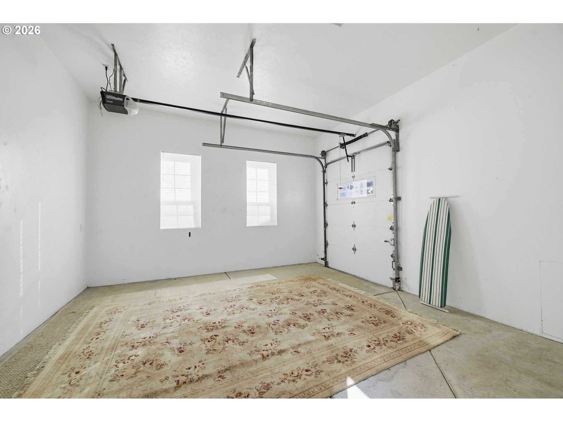 5200 Dunewood Drive Florence, OR 97439 - Photo 46 of 48 a view of a big room with wooden floor and windows