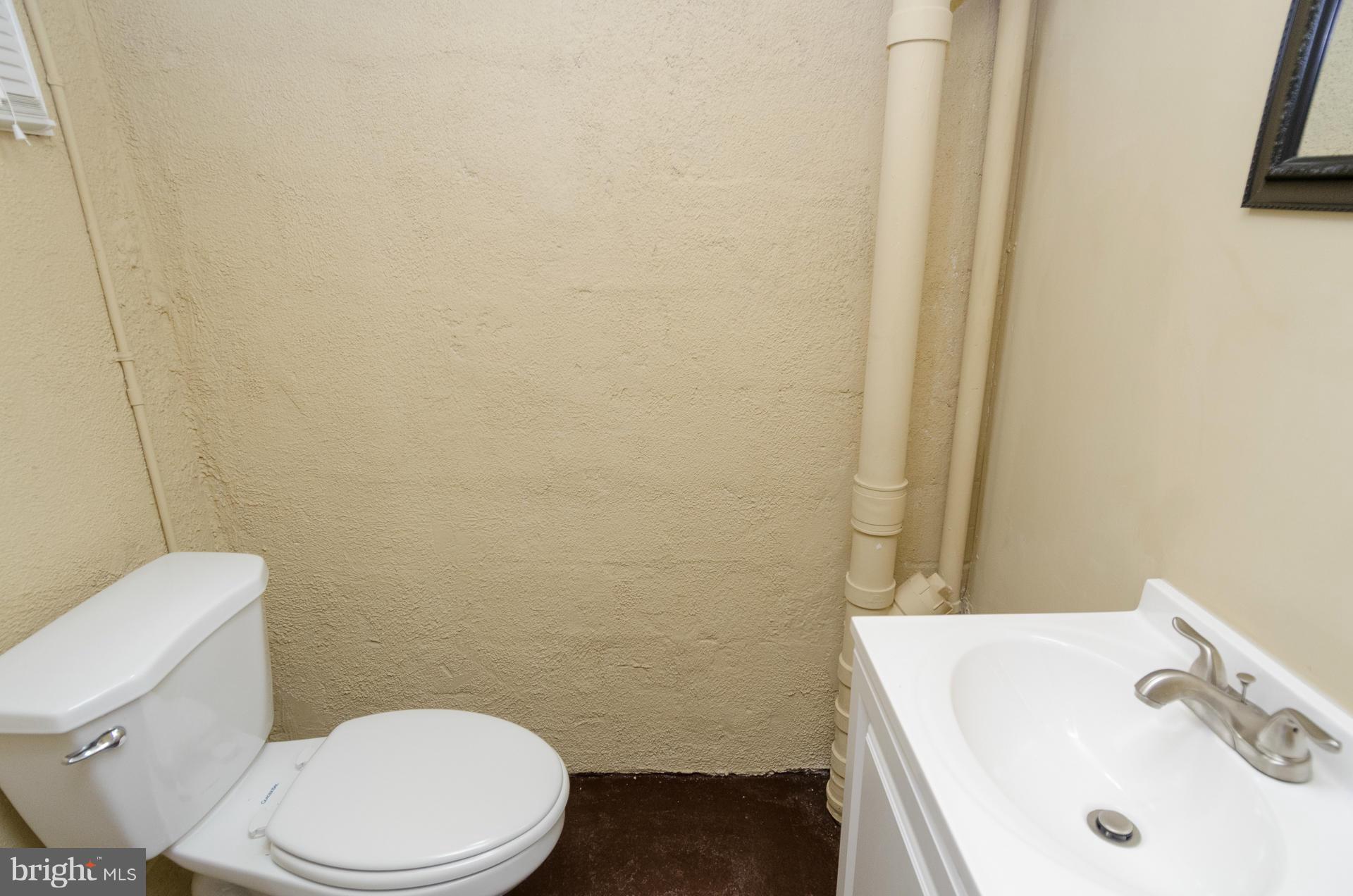 1606 East Cold Spring Lane Baltimore, MD 21218 - Photo 21 of 29 Half Bath