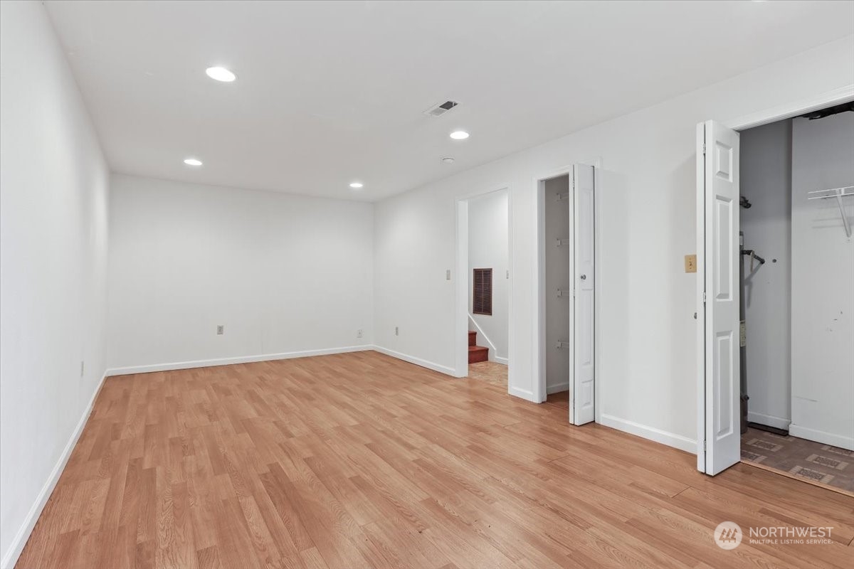 32744 30th Avenue Southwest Federal Way, WA 98023 - Photo 23 of 28 a view of empty room with wooden floor