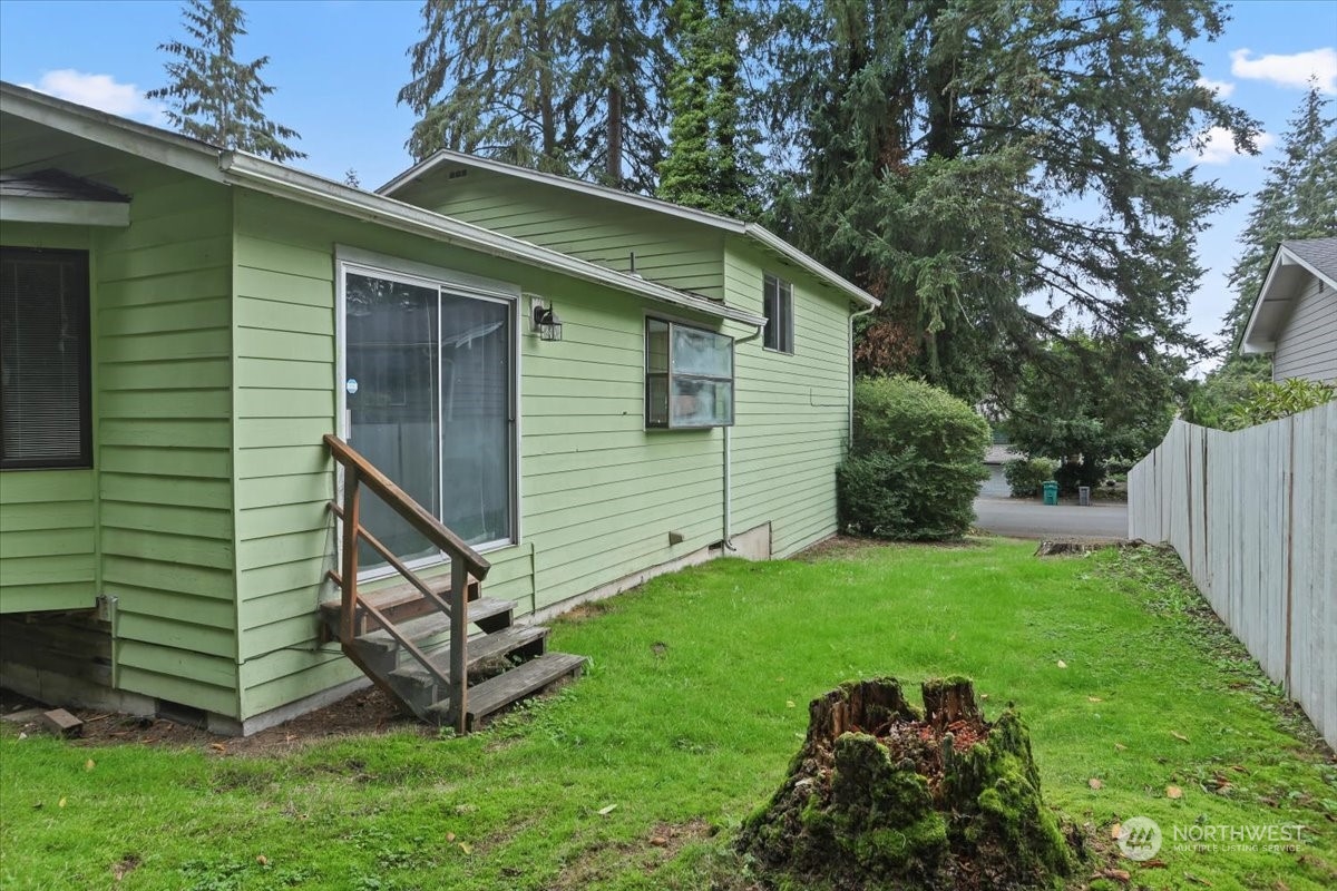 32744 30th Avenue Southwest Federal Way, WA 98023 - Photo 26 of 28 a backyard of a house with lots of green space