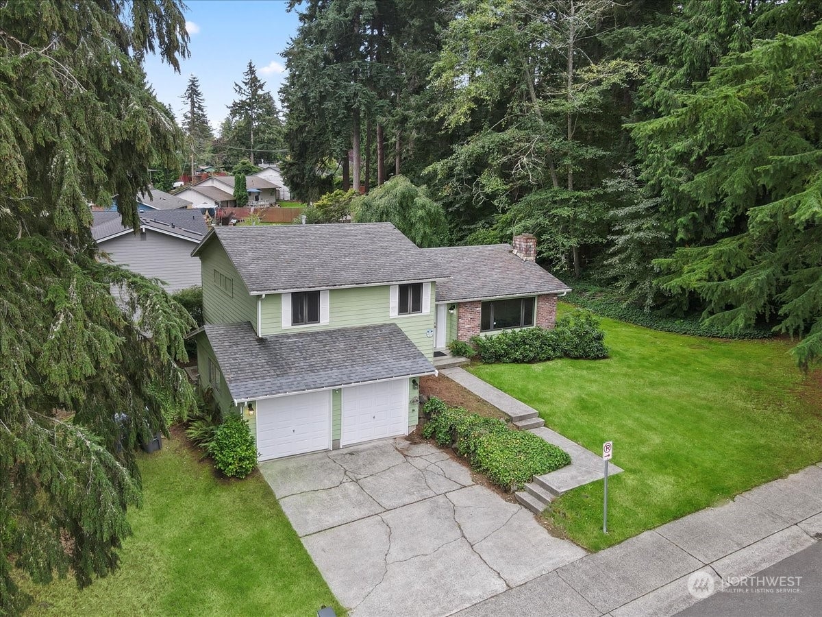 32744 30th Avenue Southwest Federal Way, WA 98023 - Photo 3 of 28 a house view with a garden space