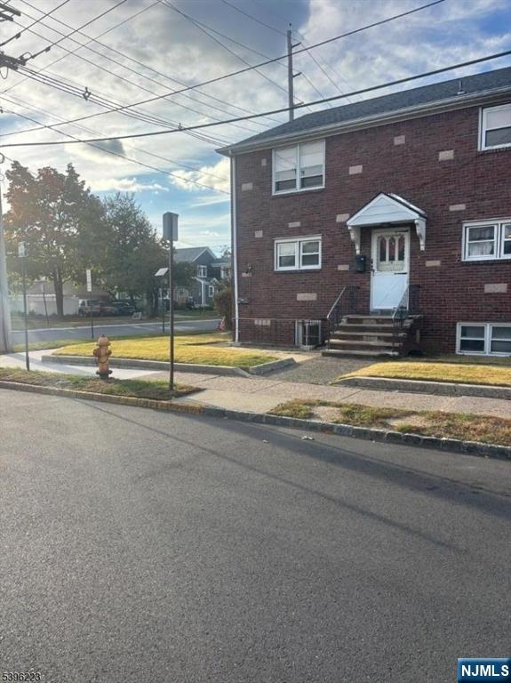 a view of swimming pool with a outdoor seating
