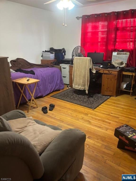 15 Watsessing Avenue, Unit 1 Belleville, NJ 07109 - Photo 11 of 13 a room with furniture window and flat screen tv