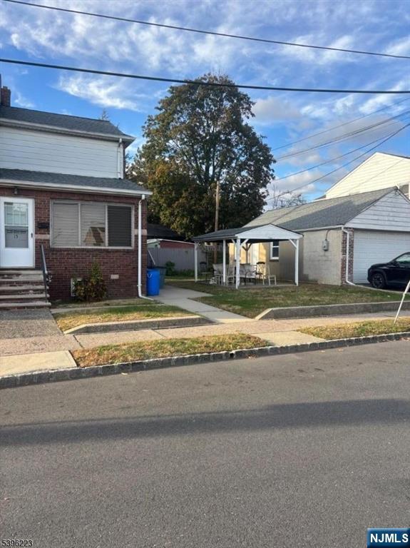 15 Watsessing Avenue, Unit 1 Belleville, NJ 07109 - Photo 13 of 13 a view of a house with a patio