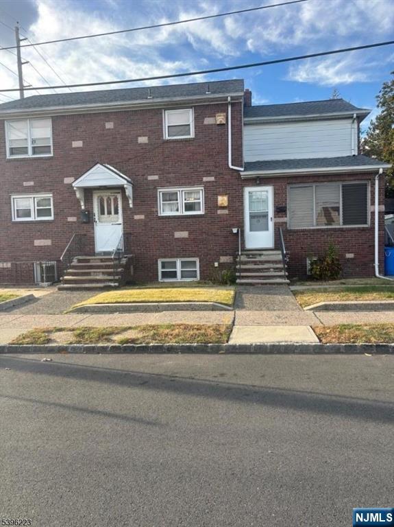 15 Watsessing Avenue, Unit 1 Belleville, NJ 07109 - Photo 2 of 13 a view of building with car parked