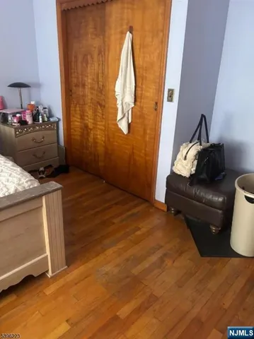 a bedroom with a bed and furniture