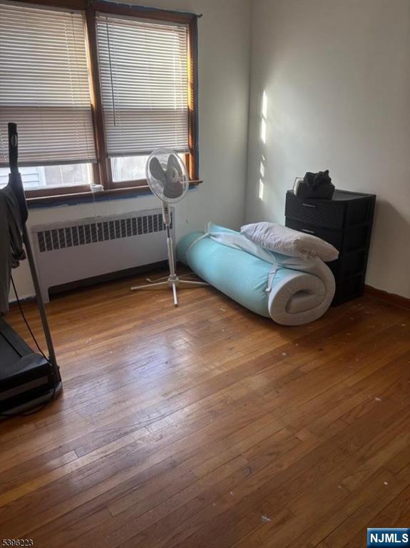 15 Watsessing Avenue, Unit 1 Belleville, NJ 07109 - Photo 6 of 13 a bedroom with a bed and a window