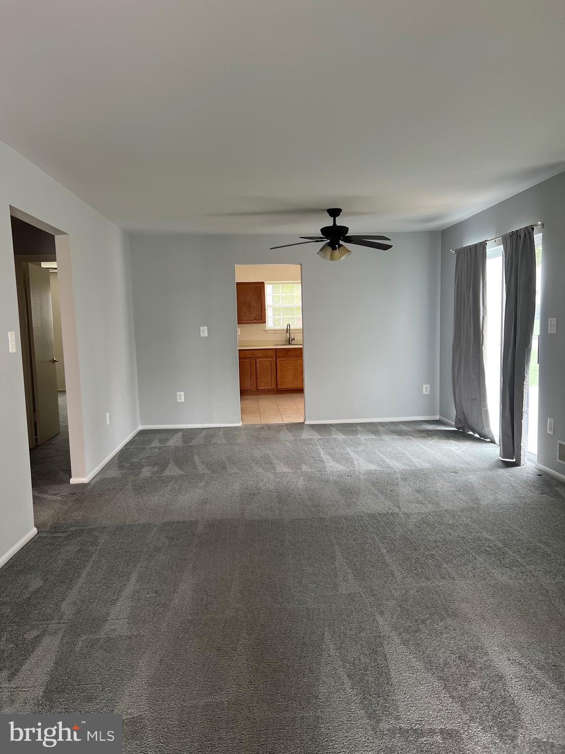 5814 Box Elder Court Frederick, MD 21703 - Photo 2 of 14 a view of a big room with closet and windows