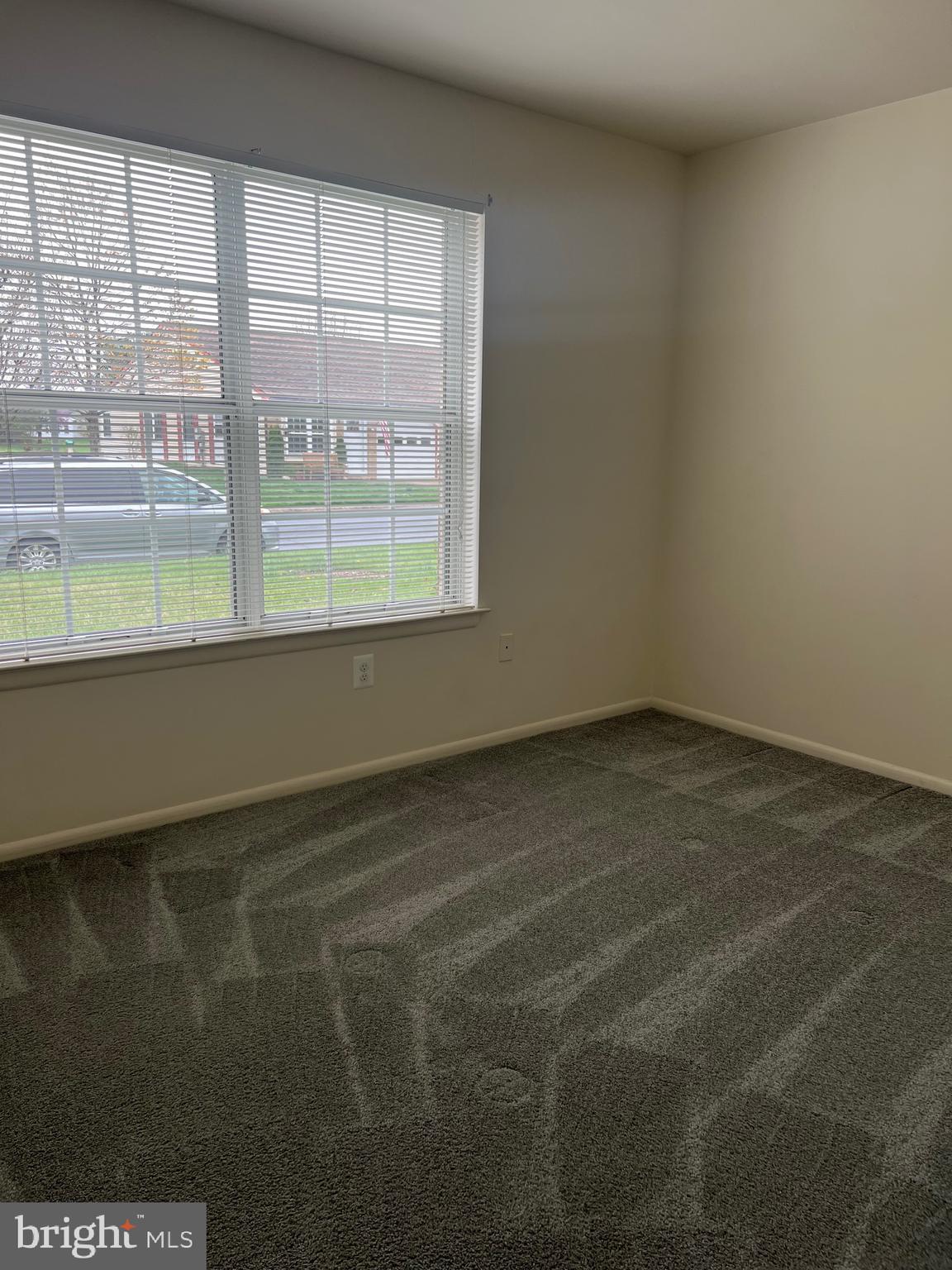 5814 Box Elder Court Frederick, MD 21703 - Photo 10 of 14 a view of an empty room with a window