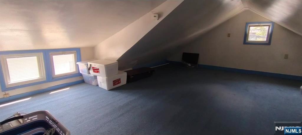 40 Eckel Road Little Ferry, NJ 07643 - Photo 12 of 21 a view of an empty room with windows